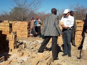 Jorgen Thomsen from Danish Church Aid inspecting bricks to be used for the classroom block.